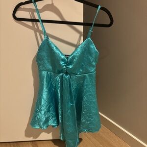 Beautiful flowy textured top just doesn’t fit the style of my other clothes